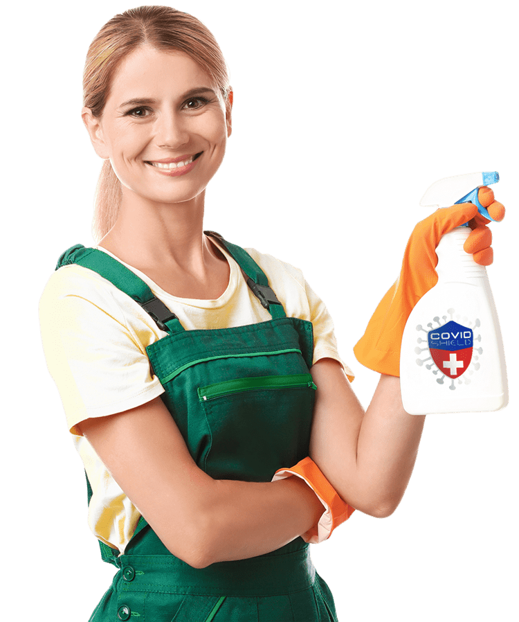 Housewife holding spray bottle of COVID Shield Disinfectant